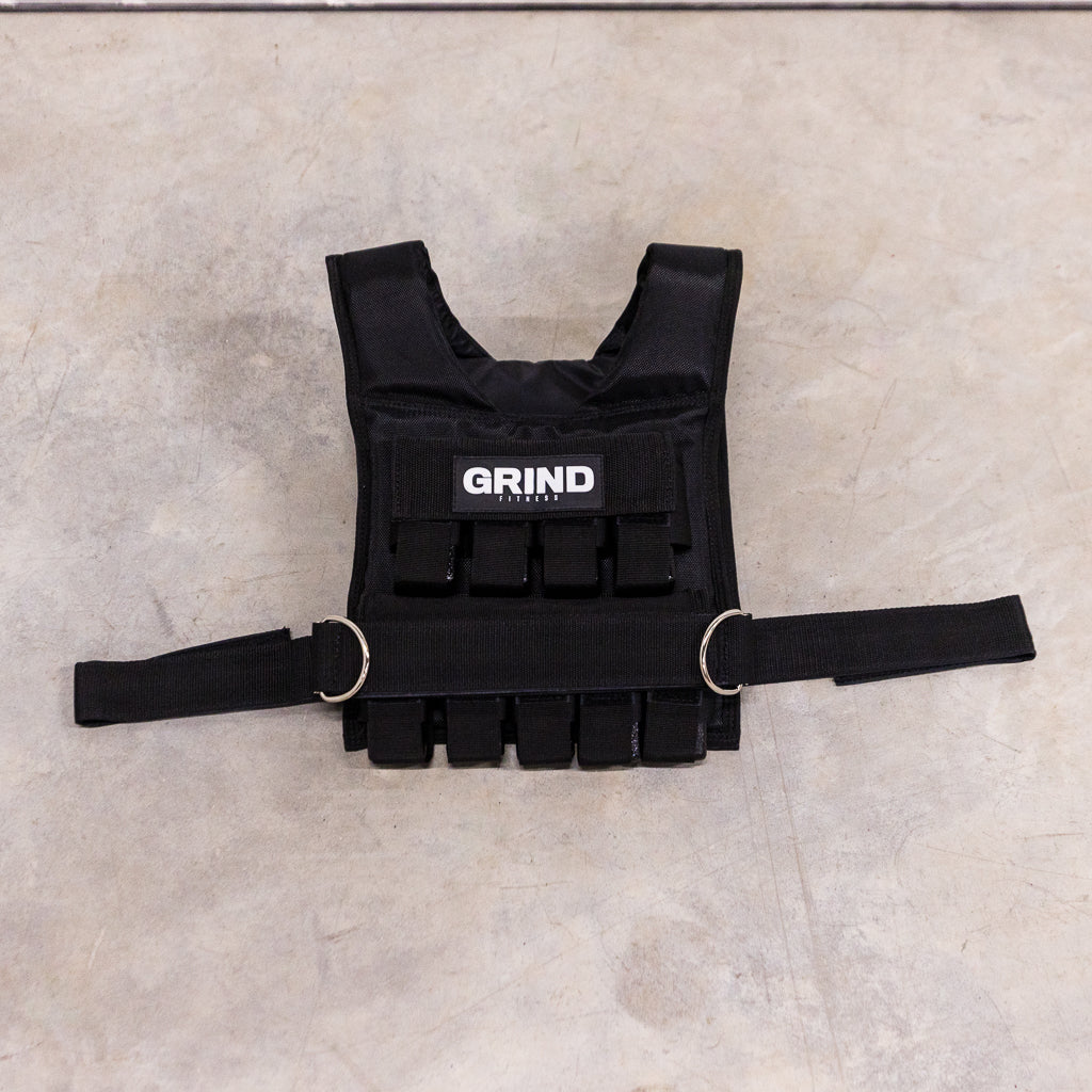 GRIND Weight Vest sitting front-up on the floor.