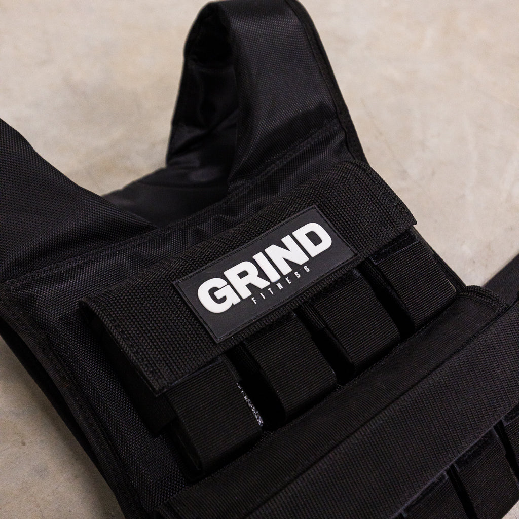 Close up of GRIND weight vest showing top four pouches for 2.25lb weights to go in.