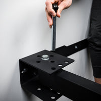 Thumbnail for Close up of how to put the pin in to lock the Fold-In Squat Rack out