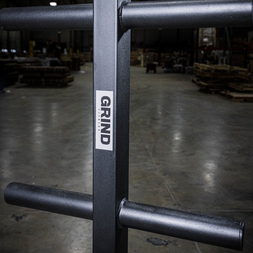 The GRIND Fitness 6-Post Weight Tree + Barbell Storage. Weight tree pegs.