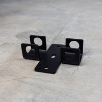 Thumbnail for GRIND Dip Handle Storage by itself on floor. Storage features two holes for the handles to go through.