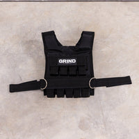 Thumbnail for GRIND Weight Vest sitting front-up on the floor.