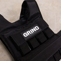 Thumbnail for Close up of GRIND weight vest showing top four pouches for 2.25lb weights to go in.