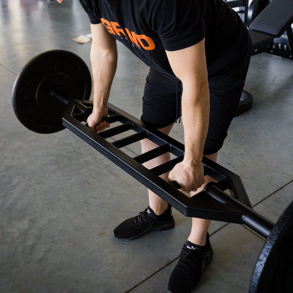 Man demonstrating bent over row with Multi-Grip Bar. 