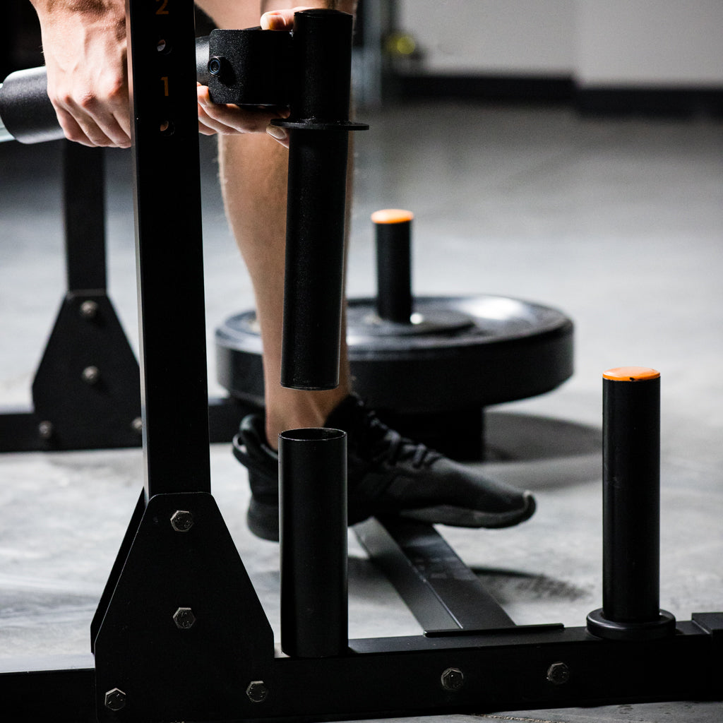 Demo of landmine being put in barbell storage on rack