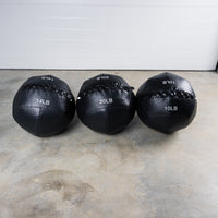 Thumbnail for Soft Wall Balls lined up on floor - 10lb, 14lb, and 20lb