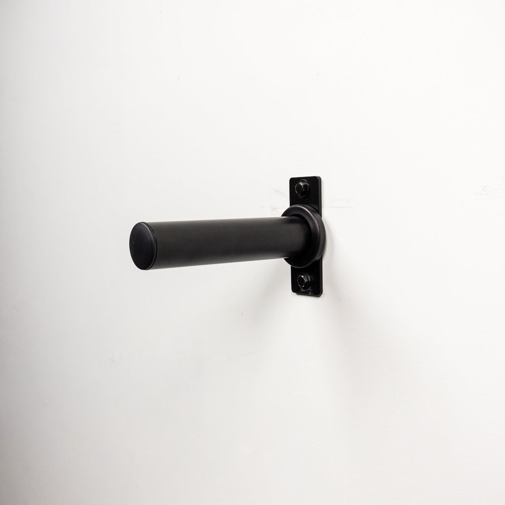 One weight peg mounted to white wall