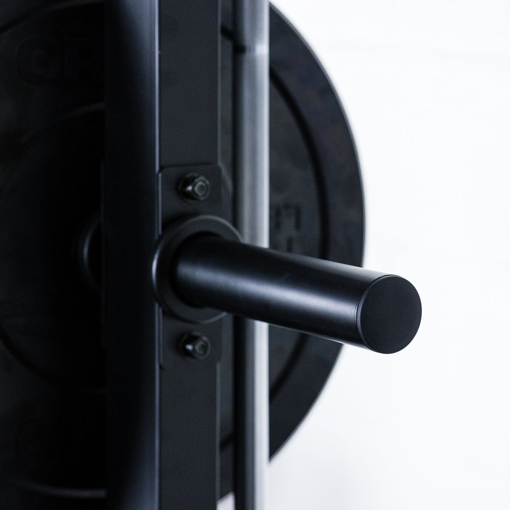 Weight peg mounted on weight lifting rack.