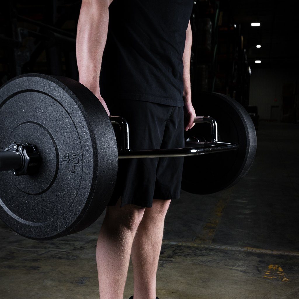 The GRIND Fitness Hex Deadlift Trap Bar Loaded With Black Crumb Rubber Bumper Plates