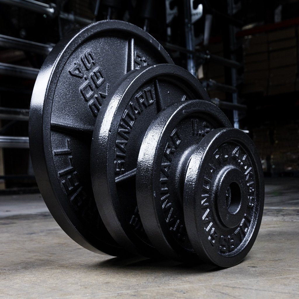 Vertically Standing The GRIND Fitness Cast Iron Weight Plates 
