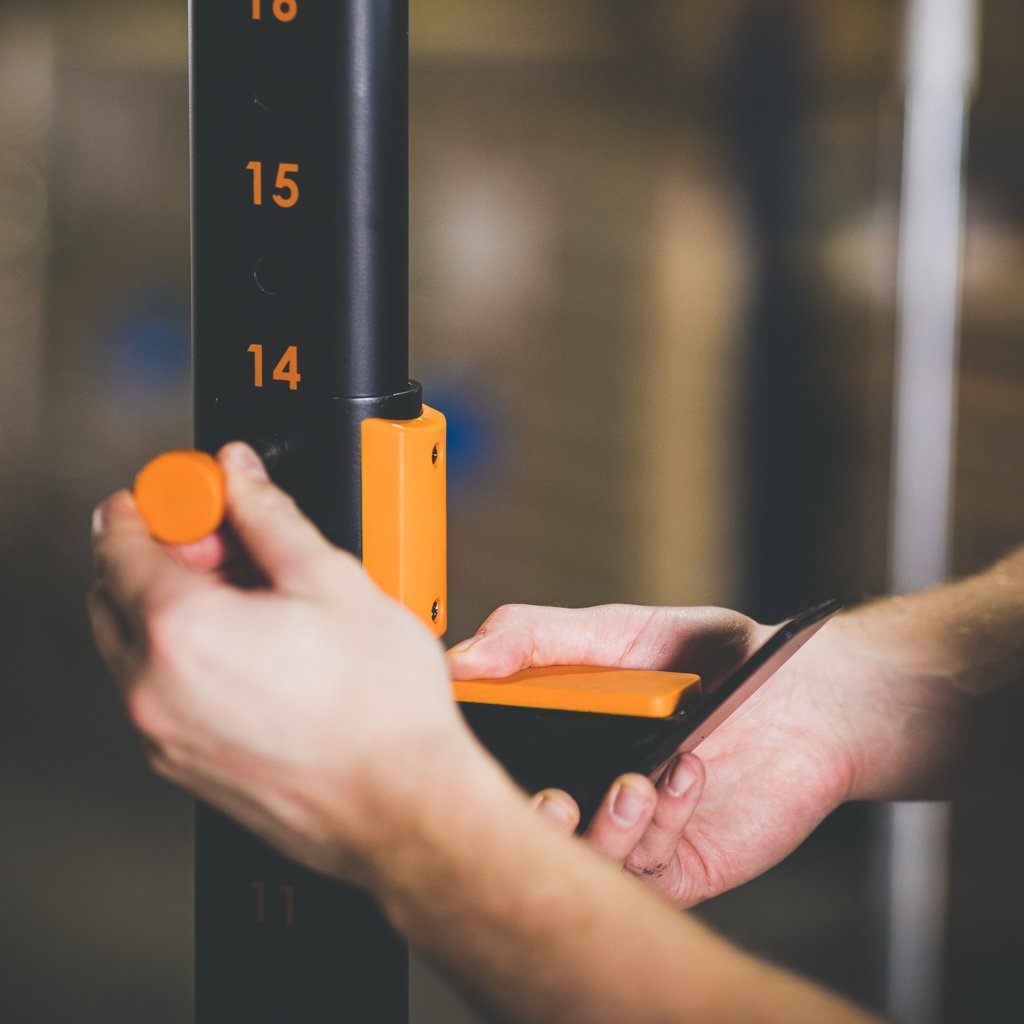 Removing a Rubber Padded J-Cup From The GRIND Fitness Alpha2000 Squat Rack