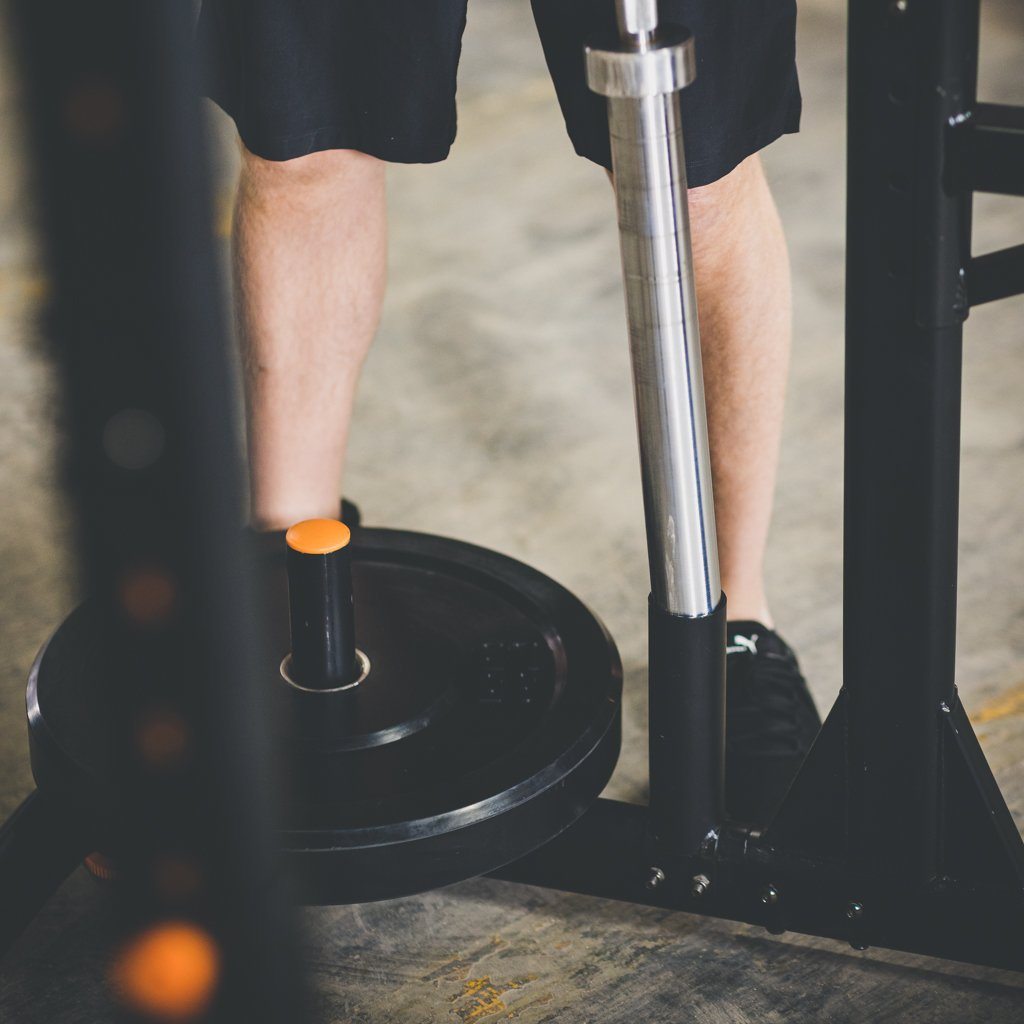 Removing a Barbell From a Barbell Holder on The Grind Alpha2000 Squat Stand