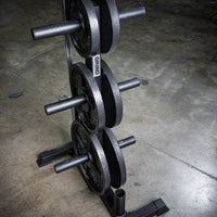Thumbnail for The GRIND Fitness 6-Post Weight Tree + Barbell Storage. With weight plates on the pegs.