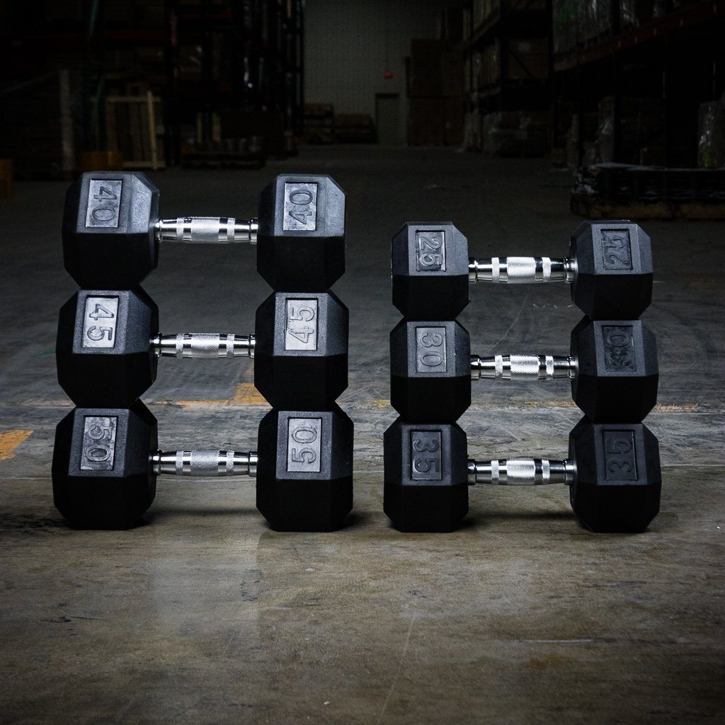 The GRIND Fitness Rubber Hex Dumbbells Midweights Stacked